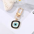 Gold Tone Layered Round Heart and Lash Evil Eye Clip Keychains view 8