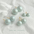 Aqua Pearl Like Round Stud Earrings In Four Graduated Sizes view 1