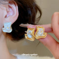 Abstract Pearl Inlay Stud Earrings with Distinctive Textured Details view 2