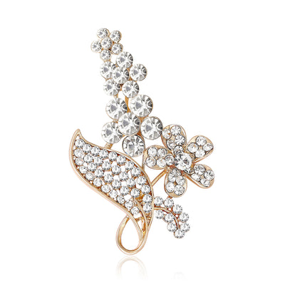 Main front view of Four Flower Crystal Spray Brooch In Gold And Silver Tones