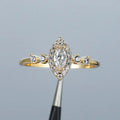 Marquise Halo Solitaire Side-Stone Ring In Polished Gold Tone view 2