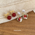 Red Horse and Pearl Bow Stud Earrings With Polished Metal Details view 4