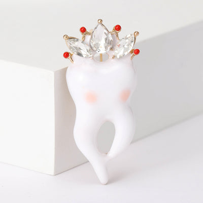 White Tooth brooch shown in front product view