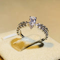 Silver-Tone Feather Band Ring with a Marquise Clear Stone view 3