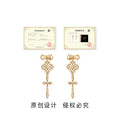 Gold Bow Flower Lace Cross Pendant Drop Earrings Pair view 3