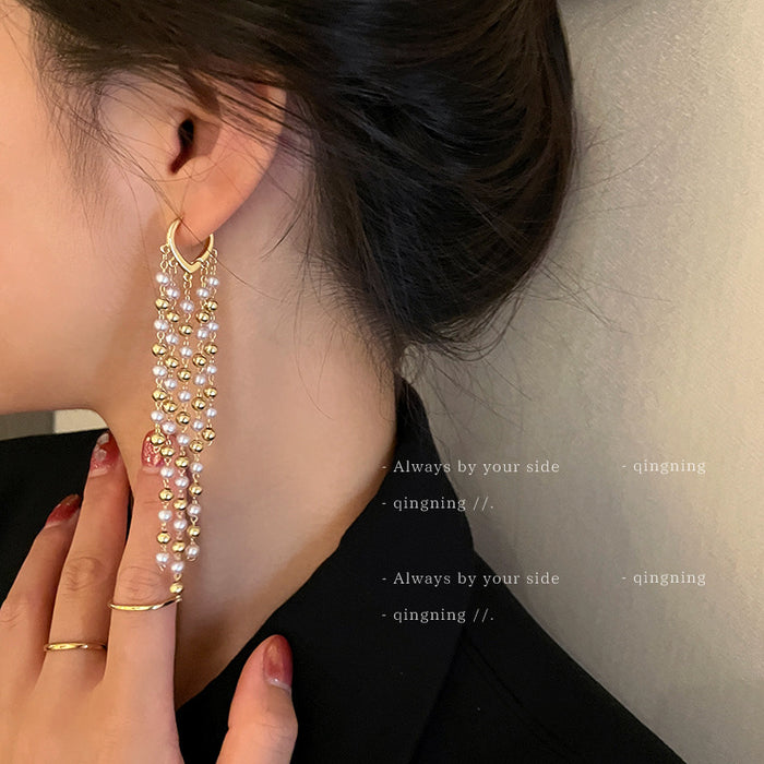 Gold Multi Strand Pearl Tassel Huggie Statement Earrings