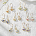Gold Tone Shell-Shaped Pressed Flower Drop Earrings in Seven Designs view 1
