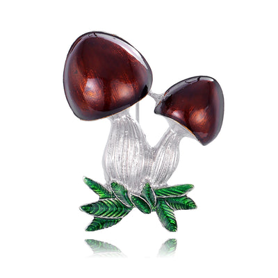 Front product view of two red glass mushrooms