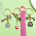 Guitar, Piano and Music Note Charm Keychains in 16 Pictured Variations for Bags and Keys view 3