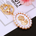 Pearl Framed Cameo Woman Keychains in White Pink and Black view 3