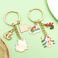 Christmas Charm Keychains Featuring Yellow Santa Across 81 Pictured Variations view 3
