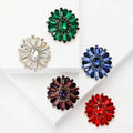 Crystal Sunburst Flower Brooch with Polished Metal and Decorative Accents view 1