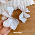 White Iridescent Dimensional Petal Flower Stud Earrings view 2