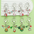 Christmas Charm Keychains Featuring Green Christmas Tree Across 81 Pictured Variations view 4