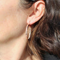 Slim Iridescent Enamel Hoop Earrings In Two Metallic Finishes view 3