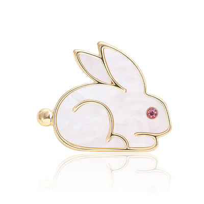 Front product view of the white enamel rabbit brooch on a light background