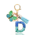 Blue Glitter Resin Letter Keychain with Butterfly Charm and Tassel view 8