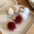 Gold Tone Snowflake Stud Earrings With Fluffy Pom Pom Drops view 2