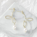 Gold Abstract Wire Drop Earrings With Teardrop Pearls view 3