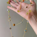 Blue Green and Amber Tone Beaded Long Necklace With Polished Metal Details view 2