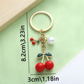 Cherry Keychain With Round Bead In Four Red And Black Styles view 7