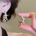 Gold Tone Chunky Hoop Earrings With White Pearl Border Accents view 2