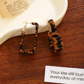 Brown and White Animal Print Open Rectangle Hoop Earrings view 4