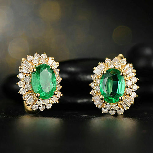 Pair of gold green oval halo clear accent earrings front view