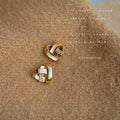 Gold Interlaced Heart Stud Earrings Clear Stone Band view 3