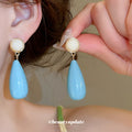 Long Teardrop Earrings in Ivory Green and Bright Blue Colorways view 4