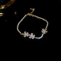 Crystal Flower Chain Bracelets in Gold and Silver Tone view 6