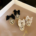 Black Bow Oval Crystal Drop Statement Earrings Pair view 3