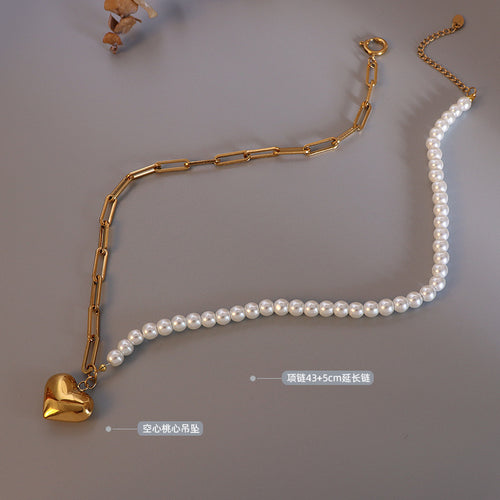 Gold heart pendant necklace flat lay with length labels