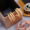 Triple Hoop Earrings In Gold Silver And Rose Gold Tones view 3