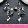 Black Polyhedral Dice and Four Point Star Clasp Keychain view 2