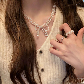 White Pearl Bow Necklace and Bracelet in Two Separate Styles