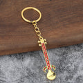 Gold Tone Long-Necked Instrument Metal Keychain in Four Colors view 7