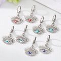 Gold and Silver Tone Crystal Lash Evil Eye Huggie Earrings view 2
