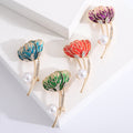 Flower Bud Brooch in Metal with Enameled Petals, a Gold-tone Stem, and a Pearl Accent view 1