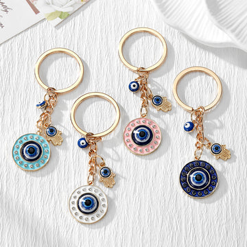 Gold Tone Round Rhinestone Evil Eye and Hamsa Keychains