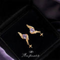 Gold Tone Purple Faceted Stone Wing And Star Drop Stud Earrings view 4