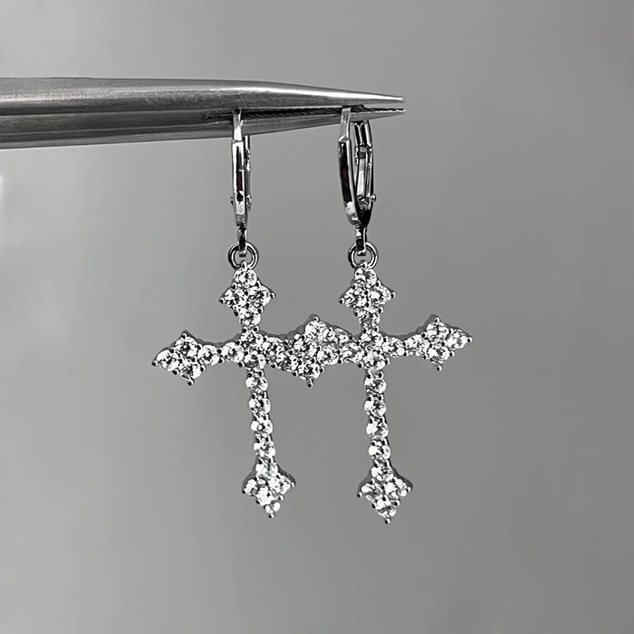 Silver Tone Crystal Cross Dangle Huggie Earrings with Decorative Accents