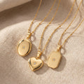 Gold Tone Hinged Photo Locket Necklace In Three Shapes view 1