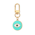 Twelve Piece Gold Tone Round Elephant and Evil Eye Clip Keychain Set view 3