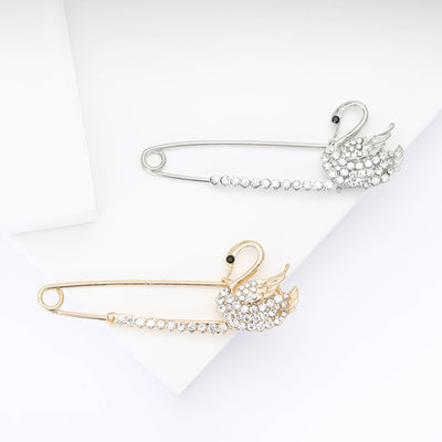 Swan Safety Pin Brooch shown alone on a light background