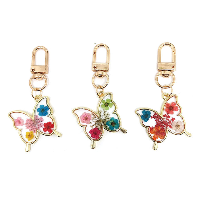 Gold Tone Pressed Flower Butterfly Resin Clip Keychains