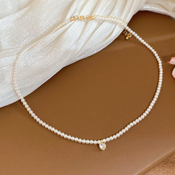 Delicate Pearl Strand Necklace with Single Pearl Drop