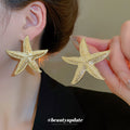 Oversized Textured Gold Tone Starfish Stud Earrings view 3