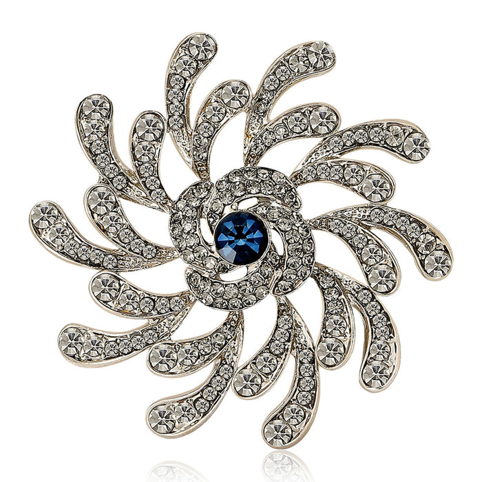 Silver Spiral Flower Brooch Clear Rhinestones Blue Center