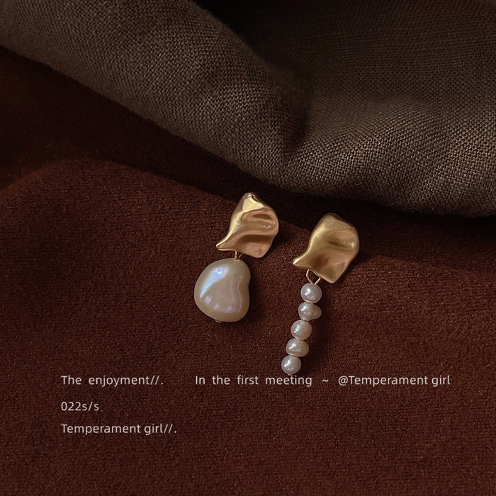 Gold Tone Pleated Top And Asymmetric White Pearl Drop Earrings